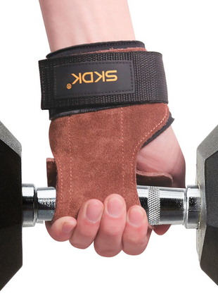 Hand wearing a brown weightlifting glove with a black wrist support holding a 10kg dumbbell.