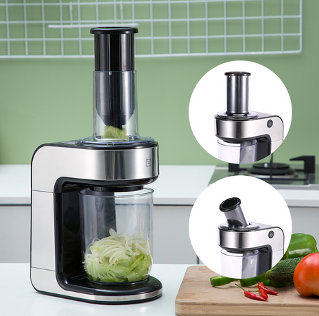 Countertop electric vegetable slicer processing vegetables