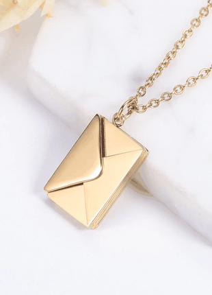 Sterling silver customizable envelope necklace with personalized engravings and keepsake design