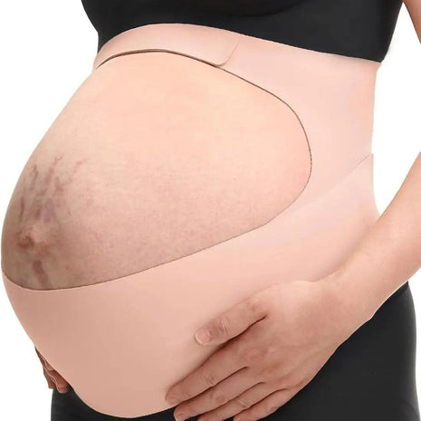 Pregnant belly with a support band on a white background