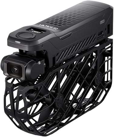 HOVER CAMERA x1 white and black 4K GPS follow-me drone with magnesium alloy body displayed with accessories