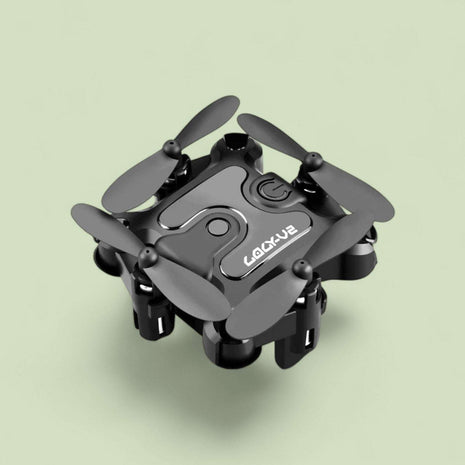 Mini folding drone with remote control, foldable compact design, HD camera, and USB charging cable
