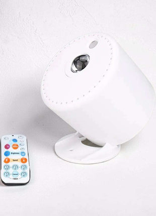 LED rechargeable Aurora star sky light projector displaying colorful patterns indoors