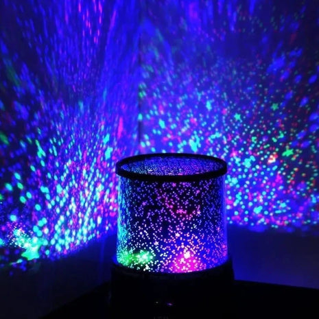 LED Star Projector Lamp casting colorful starry lights in a modern room