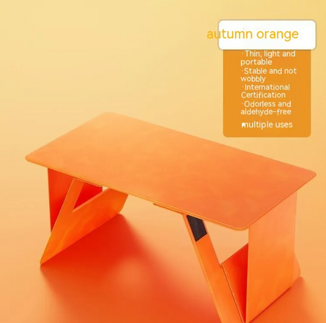 Orange portable table on a yellow background with text about its features.