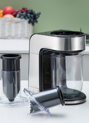 Electric vegetable slicer and shredder with transparent collection container